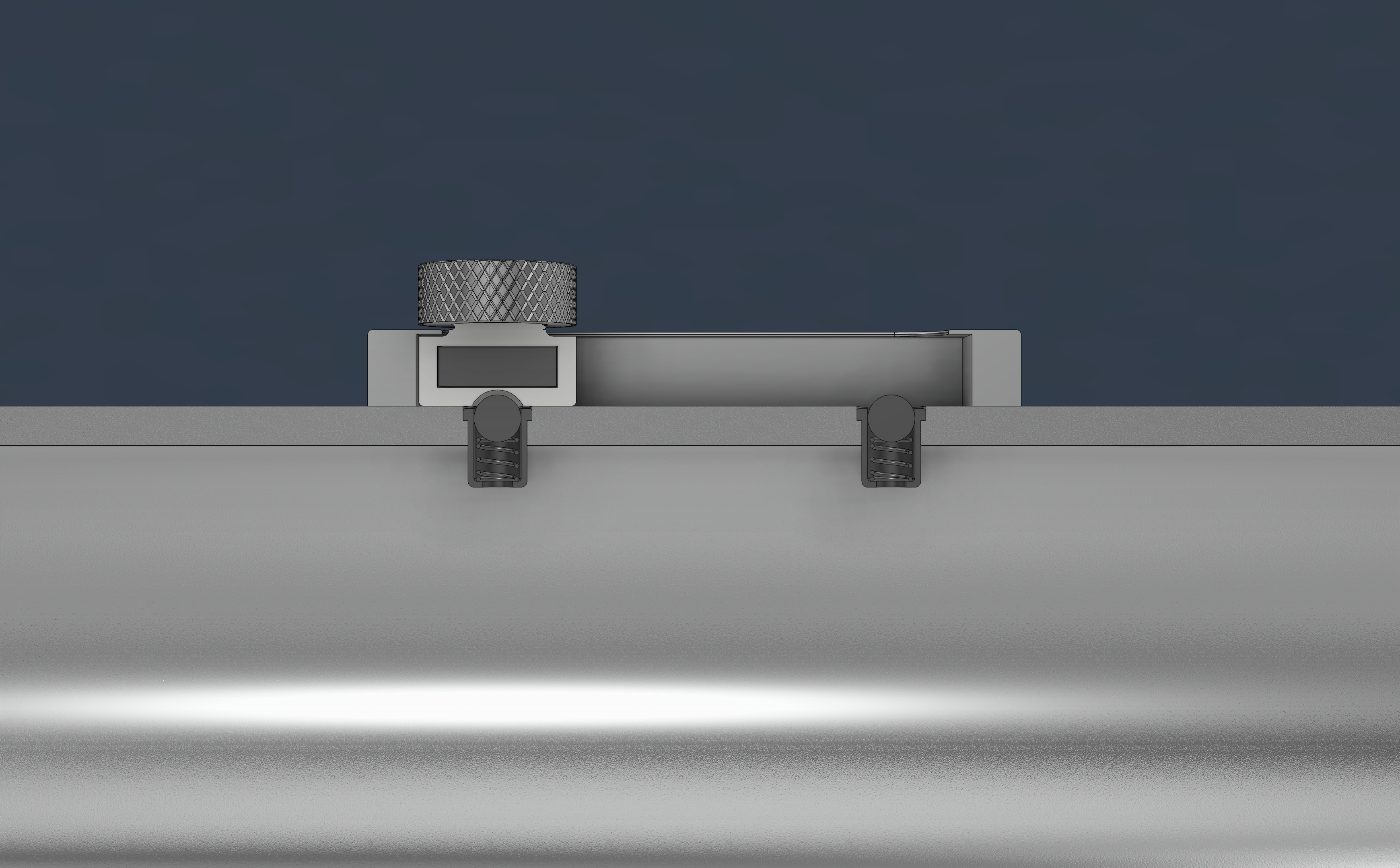 Slider mechanism showing T-slot channel, press fit ball detents, and magnet pocket